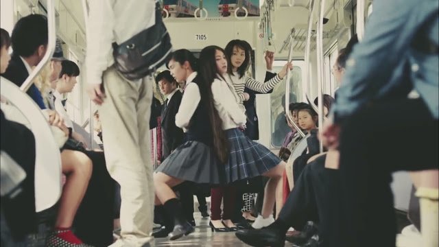 Two Japanese High School Girls Battle For A Seat On A Train In This