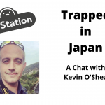 Left side shows image of Kevin O'Shea, hos tof the Just Japan Podcast. Top left shows the Japan Station logo and the right side has the text "Trapped in Japan: A Chat with Kevin O'Shea."